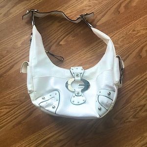 White and silver guess purse.